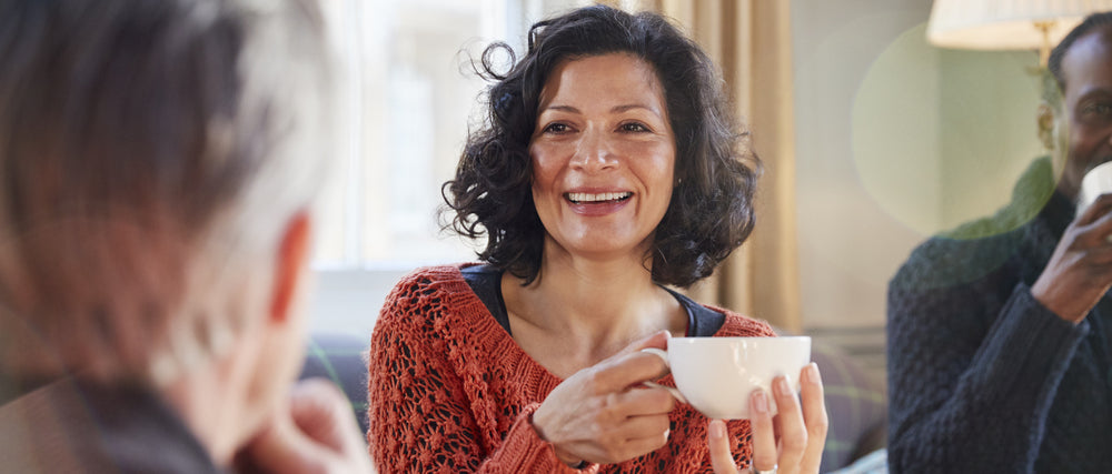 latina enjoying coffee with a  healthy mindset and wellness